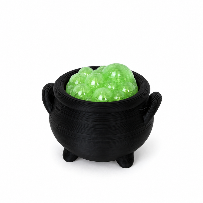 Bubbling Cauldron fidget clicker: a black three-legged pot filled with glowing green bubbles